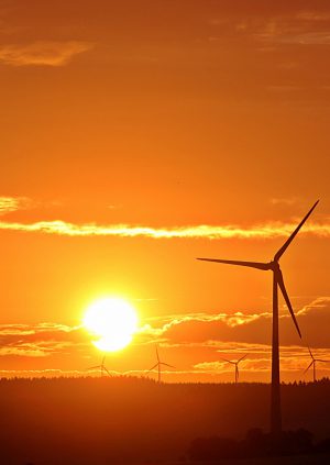 Green Energy of a Wind Mill with a Sunrise over Saskatchewan